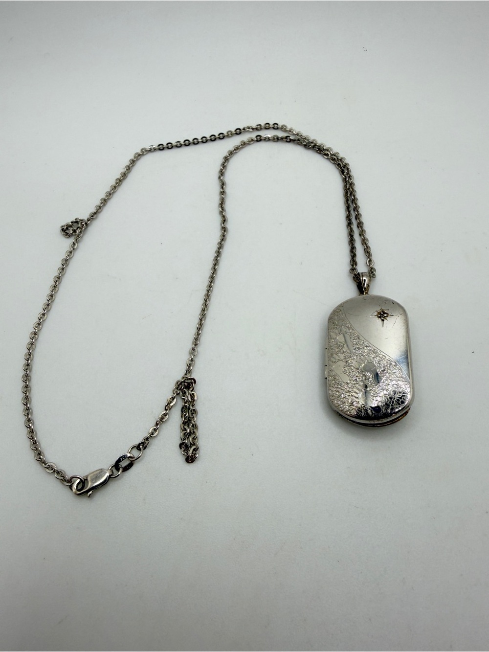 18" Sterling Silver "Footprints" locket, necklace w/ tiny‎ diamond chip star!